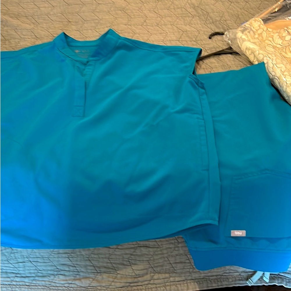 Rafaela figs set with jogger bottoms.